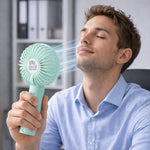 Portable handheld fan with battery included – lightweight & easy to carry